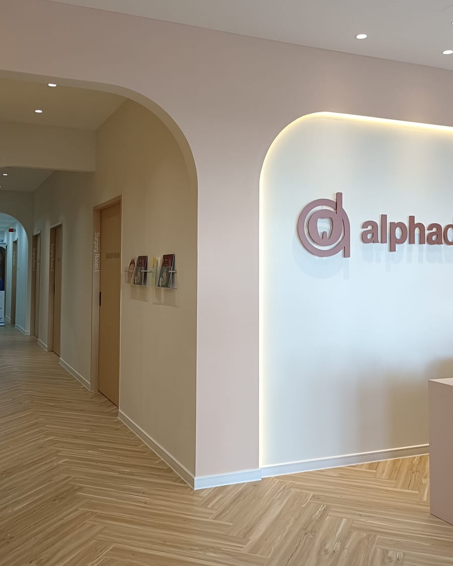 Archway entrance leading to the reception area at Alpha Dental, Sutera Utama, Skudai