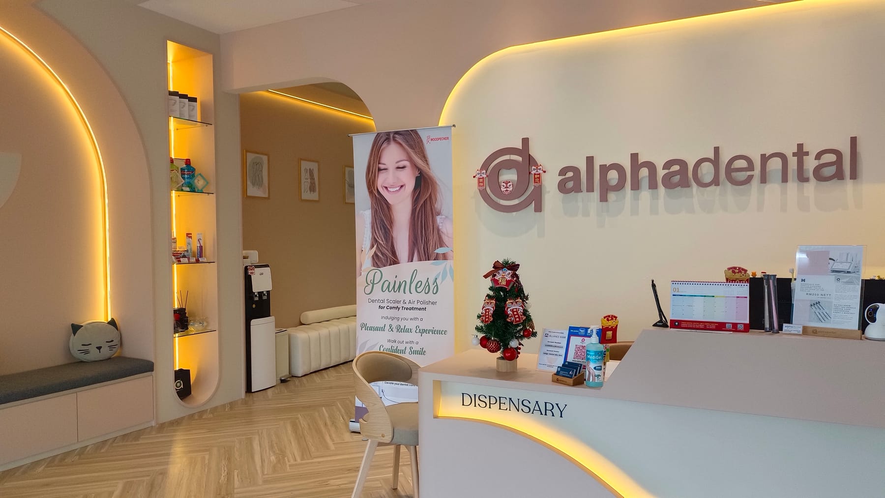 The reception and waiting area at Alpha Dental, Sutera Utama